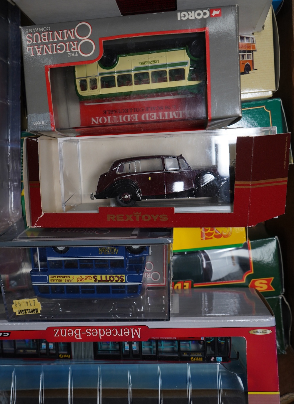 Sixteen boxed diecast vehicles by Corgi, Corgi Classics, OOC, etc. including; buses, coaches, tankers, Eddie Stobart vehicles, etc. Condition - good.